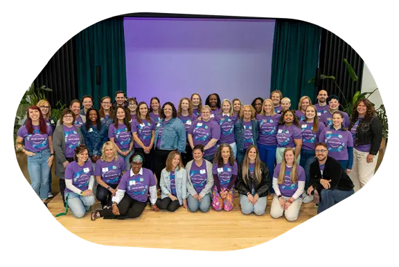 Arbor Circle staff wearing matching shirts at event